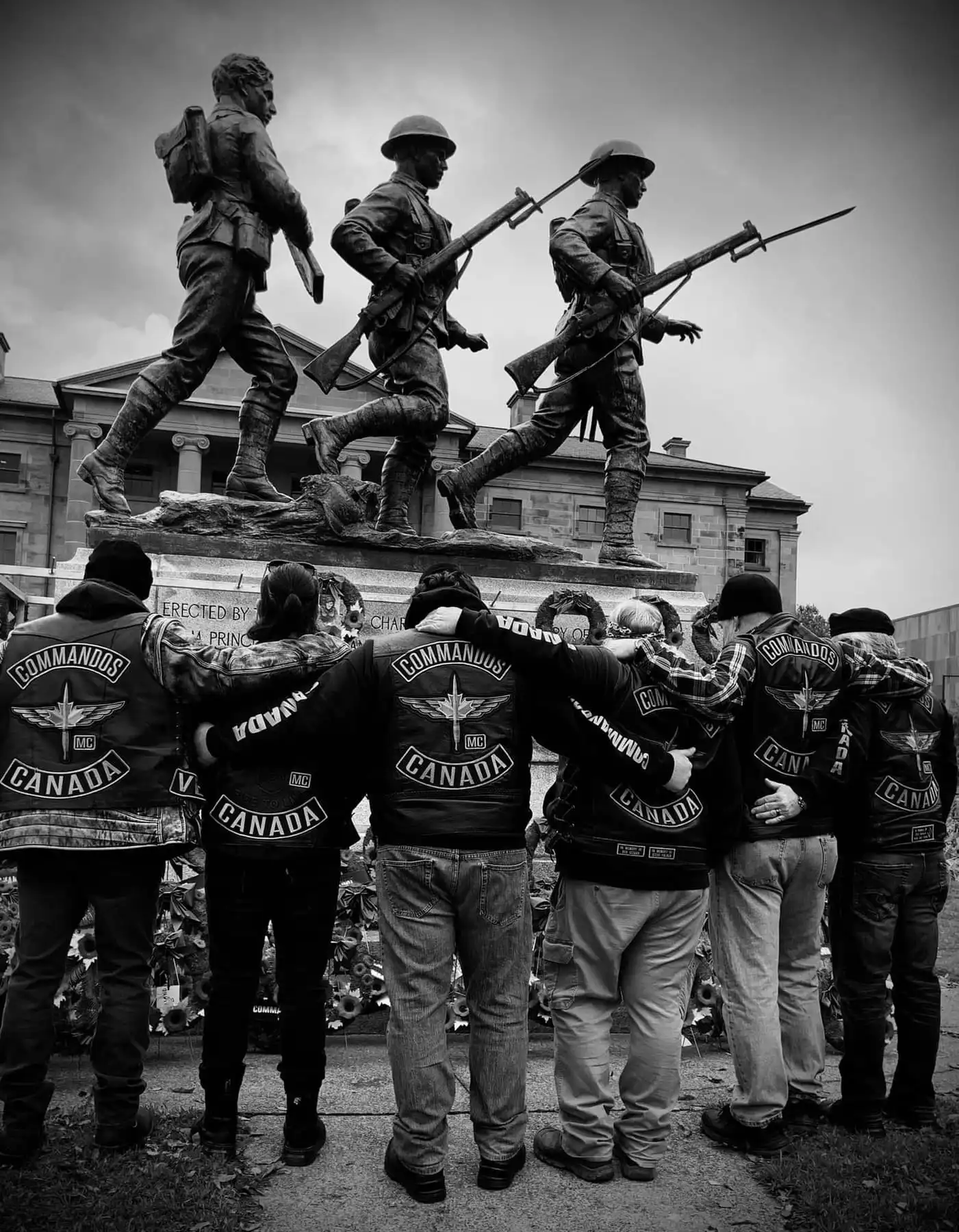 Prince Edward Island members arm in arm